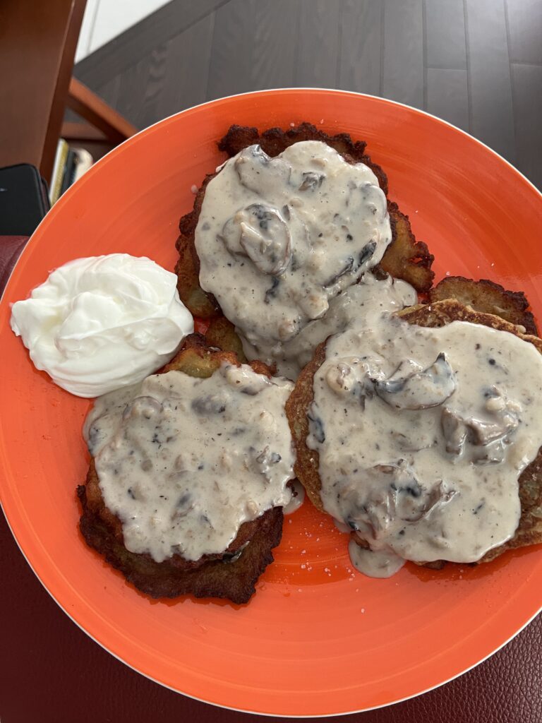 Potato pancakes with mushroom sauce