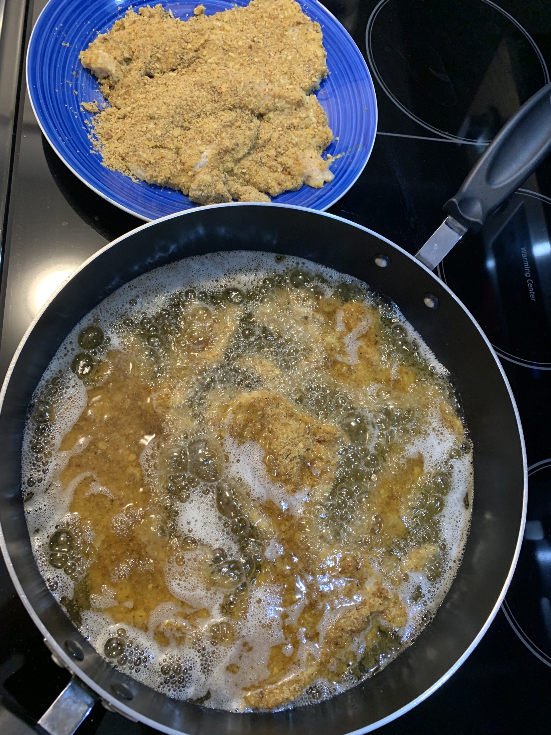 chicken breasts on the frying pan