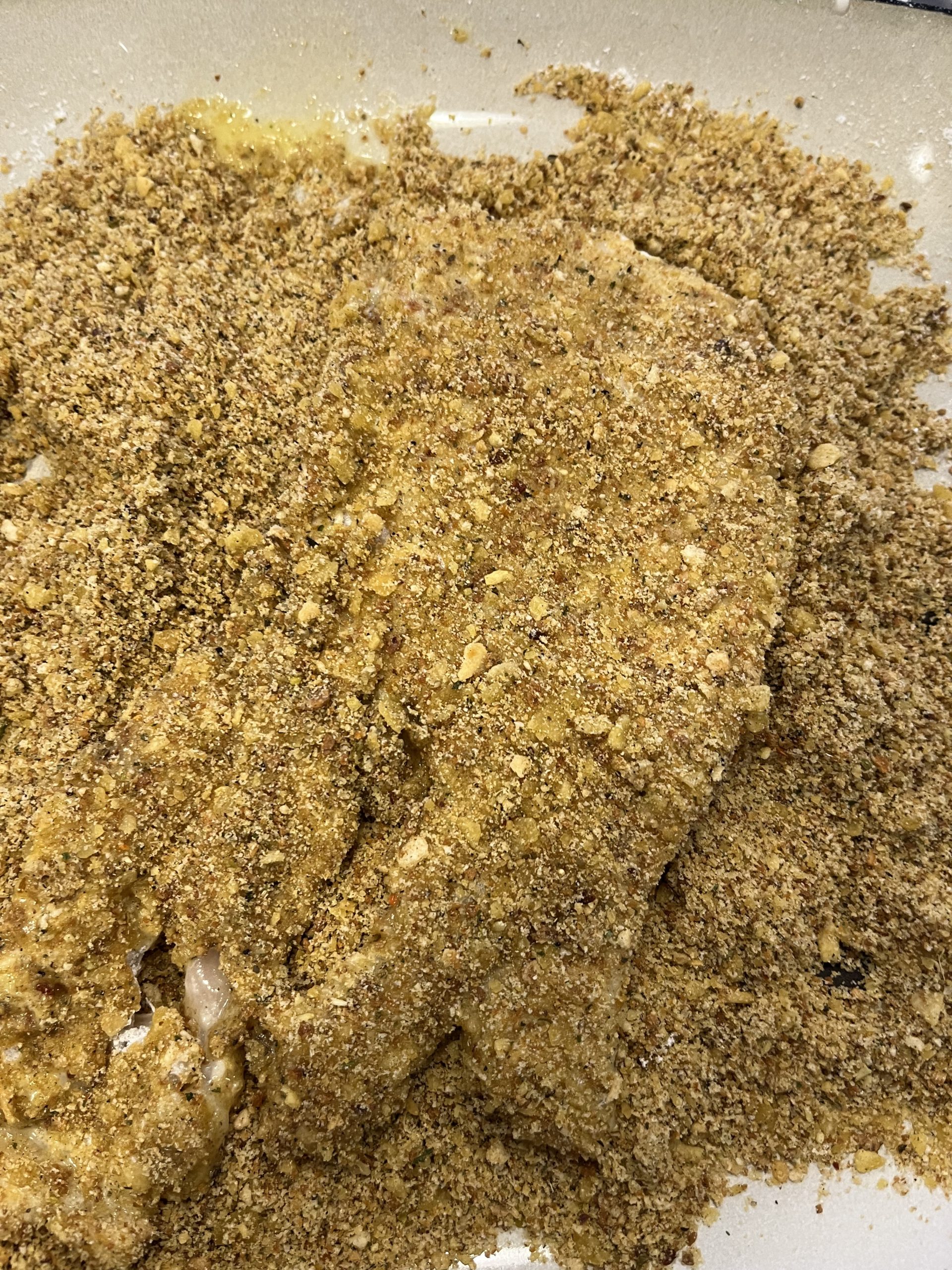 chicken breast coated with breadcrumbs