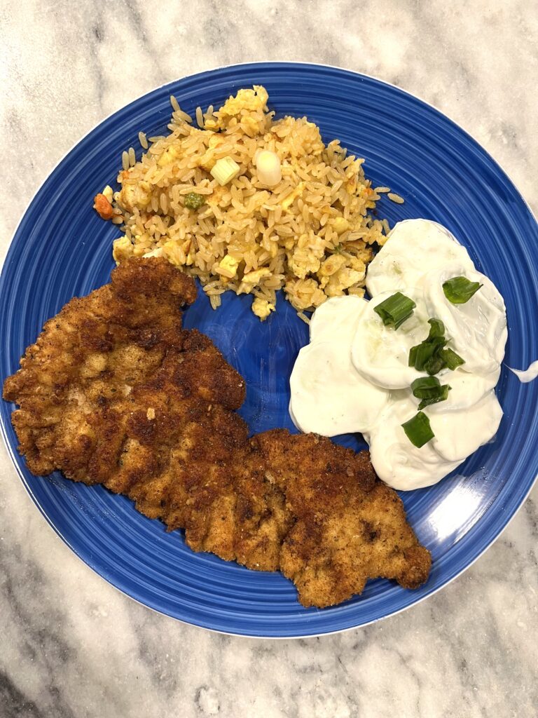 Polish cucumber salad with chicken cutlets and rice