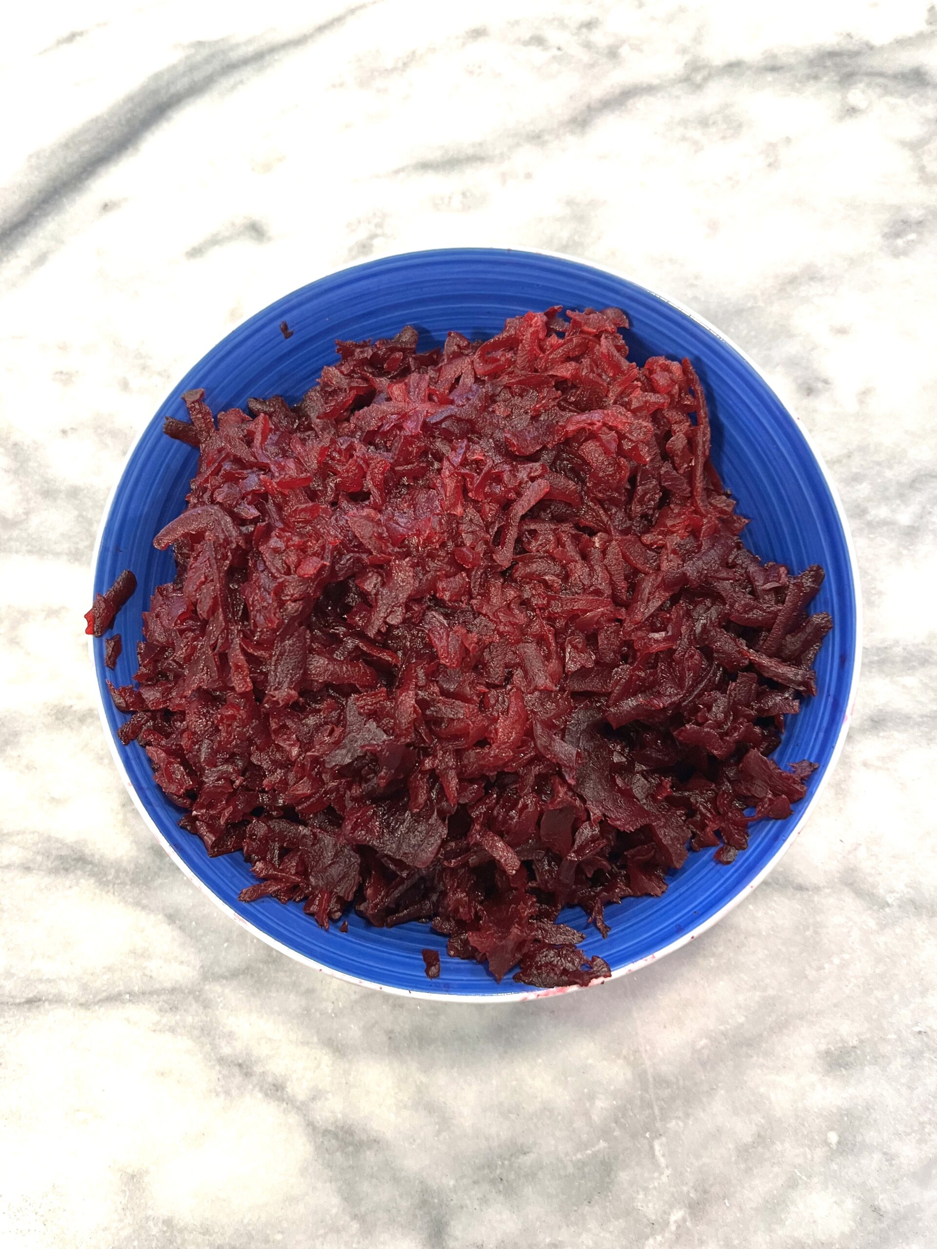 Grated beets on the plate