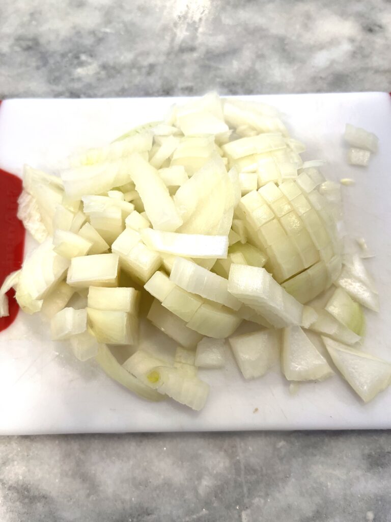 chopped onions for Polish mushroom soup aka zupa grzybowa