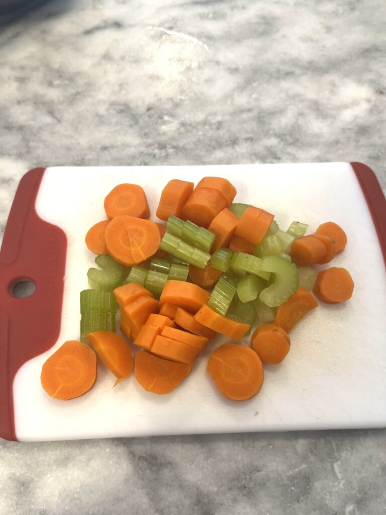 chopped carrots for Polish mushroom soup aka zupa grzybowa