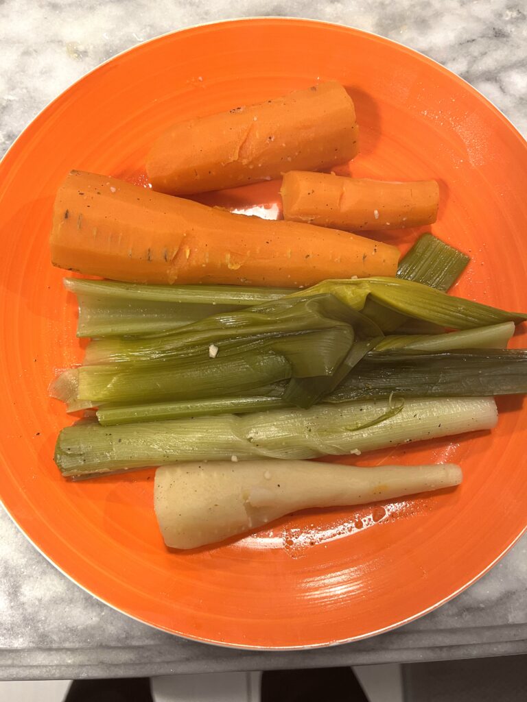 cooked vegetables for Polish Sauerkraut Soup aka Kapusniak