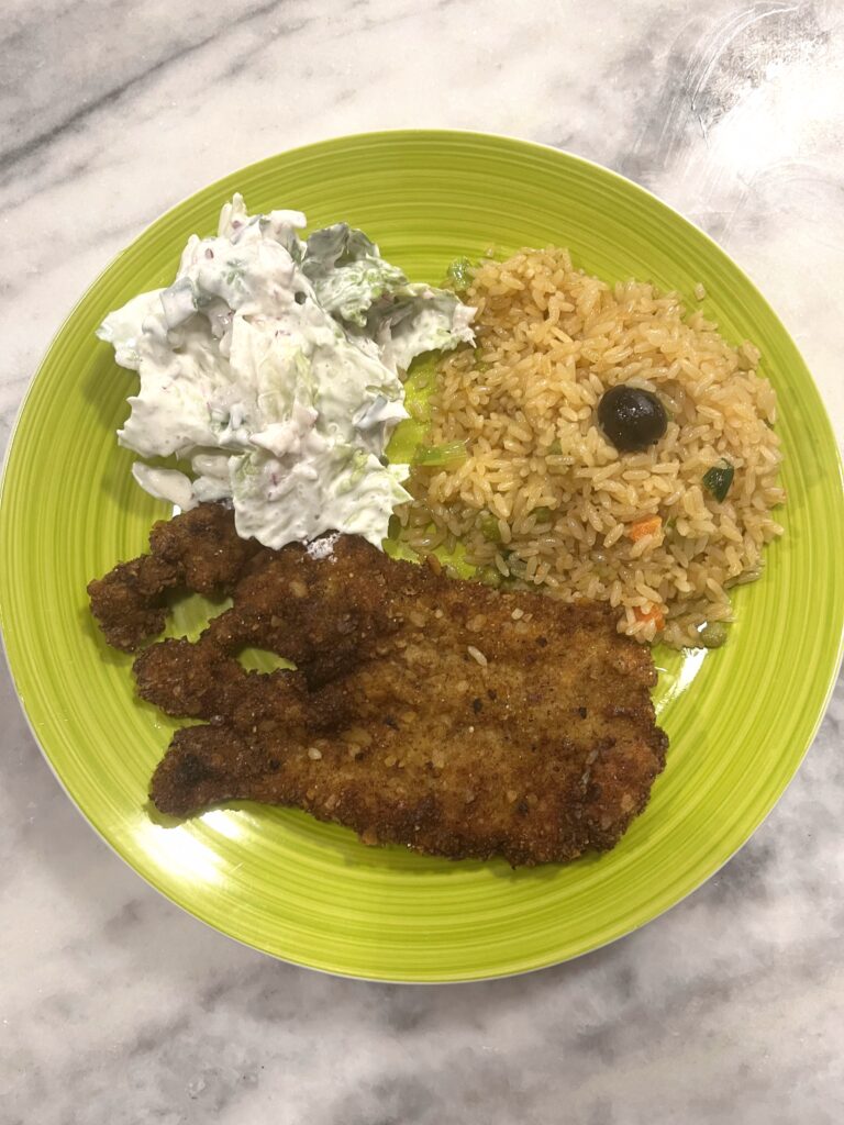 lettuce salad with rice and chicken cutlet 