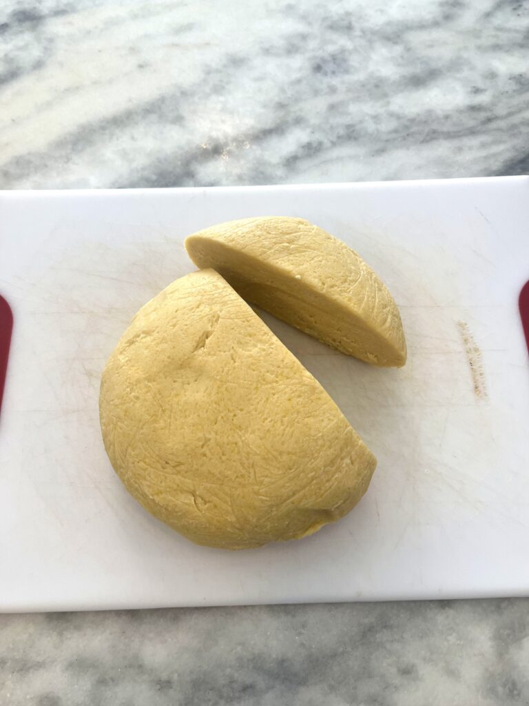 dividing dough for Polish apple pie aka Szarlotka