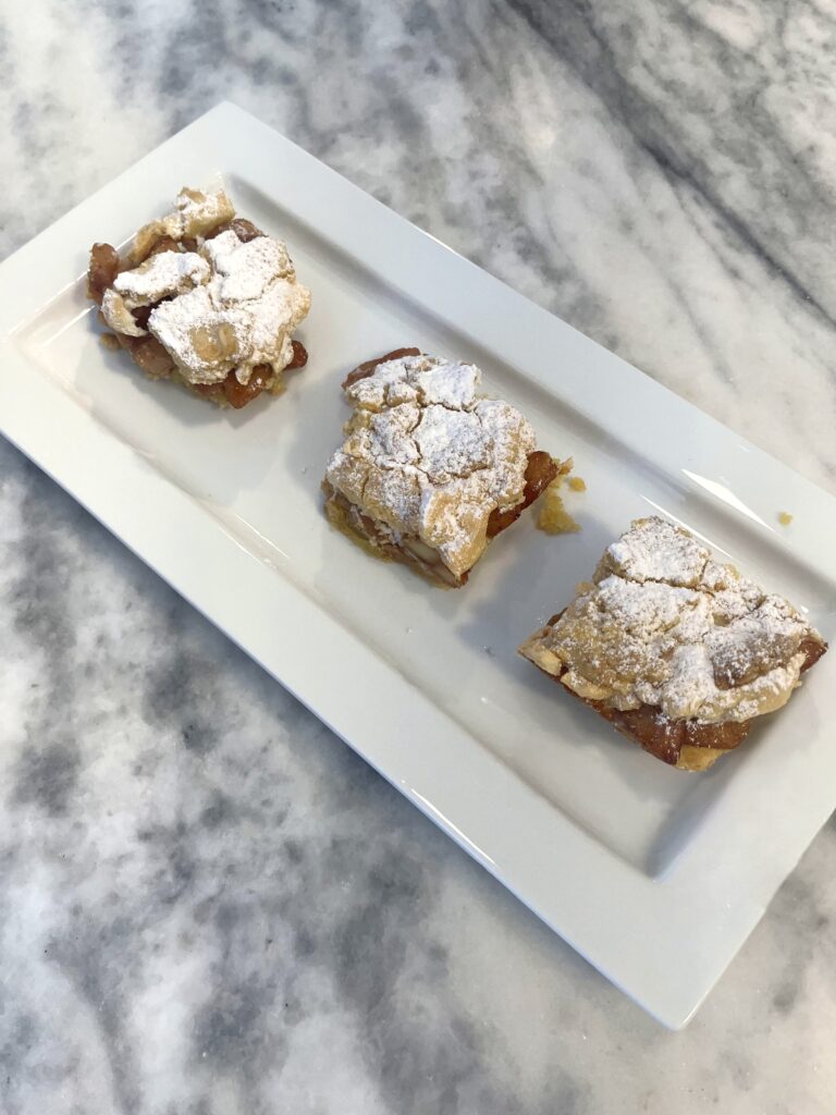 Polish apple pie aka Szarlotka dusted with sugar