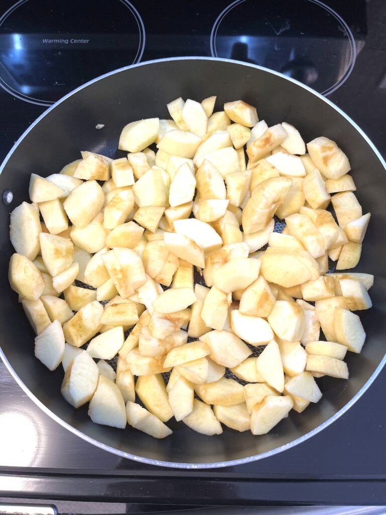 apples on the frying pan for Polish apple pie aka Szarlotka