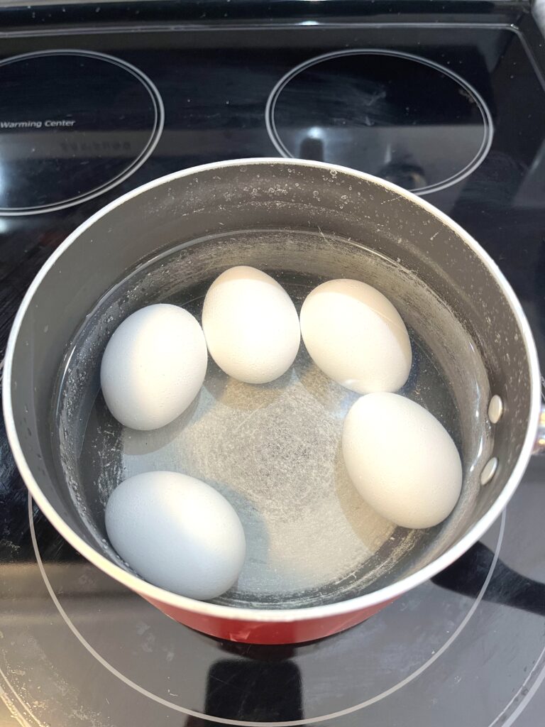 boiling eggs for Polish vegetable salad aka Sałatka