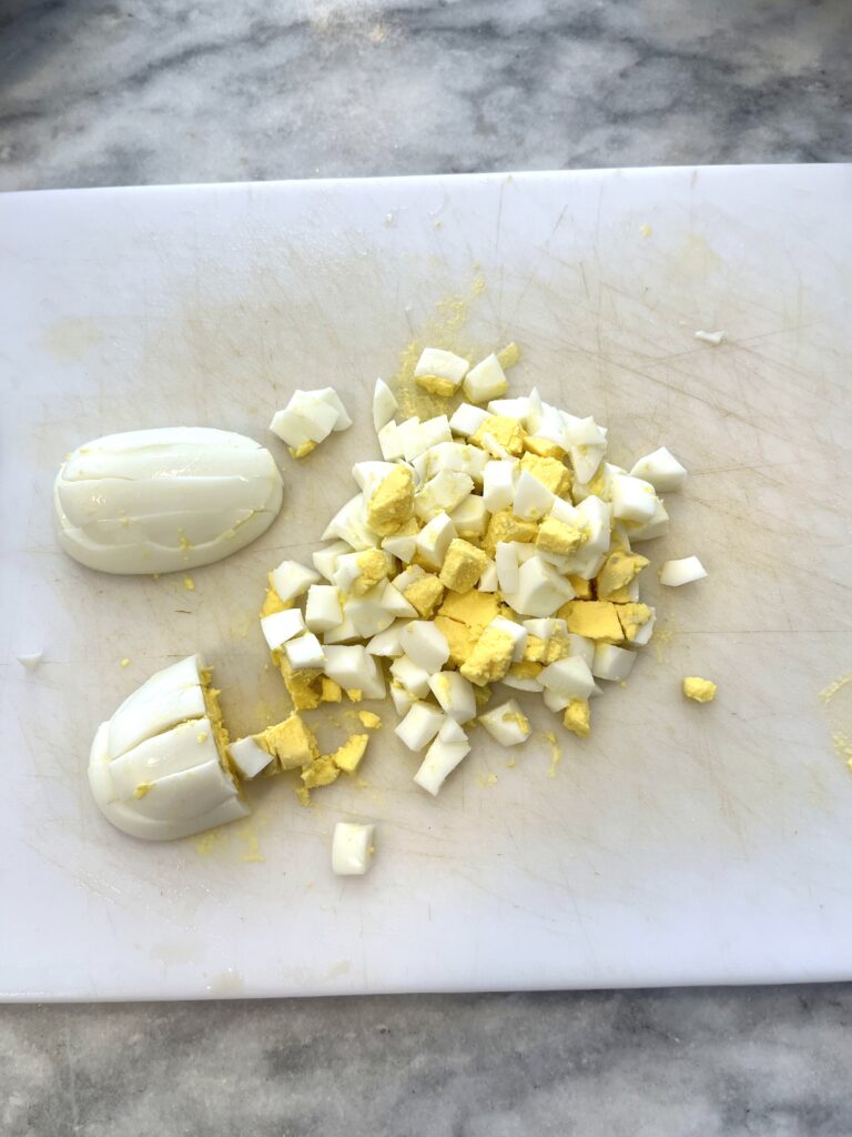 chopped eggs for Polish vegetable salad aka Sałatka