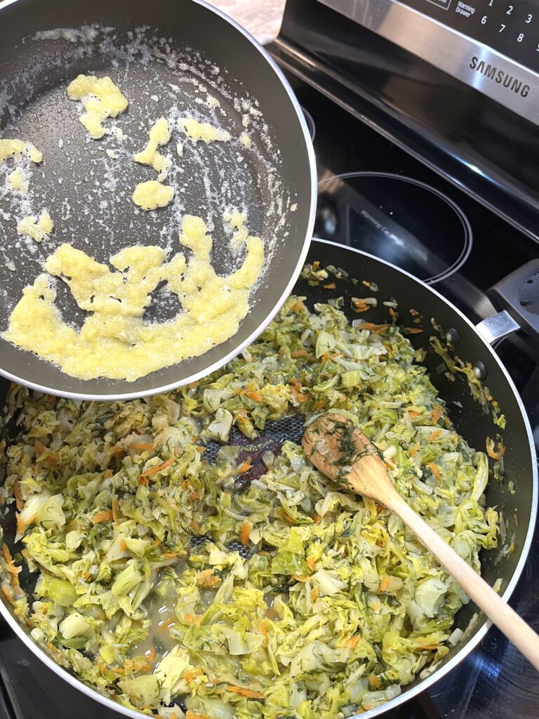 adding roux to cabbage mixture for Spring Cabbage aka Młoda Kapusta