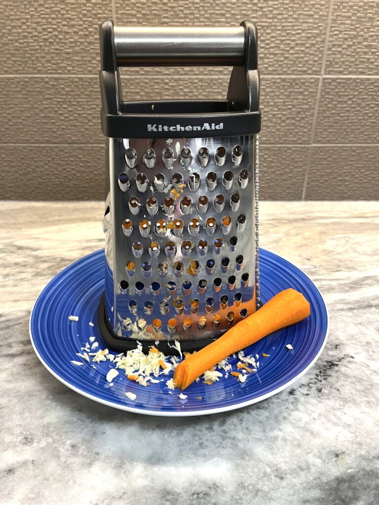 grating carrots for Spring Cabbage aka Młoda Kapusta